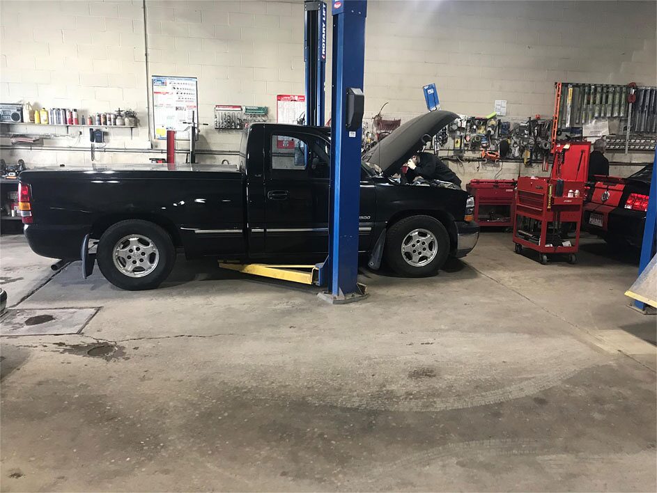 Vehicle being serviced in the shop